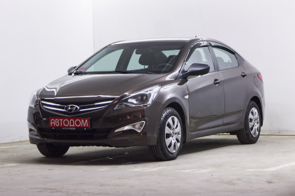 Продажа Hyundai Solaris I Рестайлинг 1.6 MT (123 л.с.) 2015 Коричневый в Автодом
