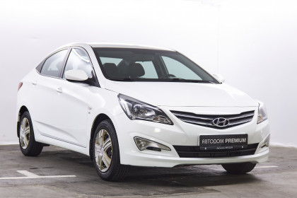 Продажа Hyundai Solaris I 1.6 AT (123 л.с.) 2014 Белый в Автодом