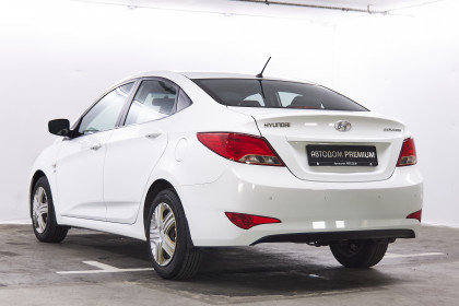 Продажа Hyundai Solaris I 1.6 AT (123 л.с.) 2014 Белый в Автодом