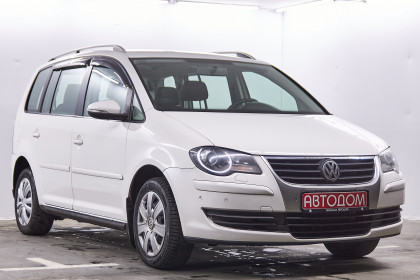 Продажа Volkswagen Touran I Рестайлинг EcoFuel 1.4 AMT (150 л.с.) 2009 Белый в Автодом
