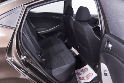 Продажа Hyundai Solaris I Рестайлинг 1.4 MT (107 л.с.) 2015 Коричневый в Автодом