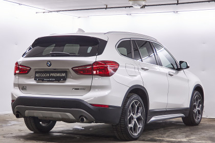 Продажа BMW X1 II (F48) 28i xDrive 2.0 AT (231 л.с.) 2018 Белый в Автодом