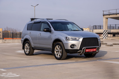 Продажа Mitsubishi Outlander II Рестайлинг 2.0 CVT (147 л.с.) 2010 Серебристый в Автодом