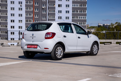 Продажа Renault Sandero II Рестайлинг 1.6 MT (82 л.с.) 2018 Белый в Автодом
