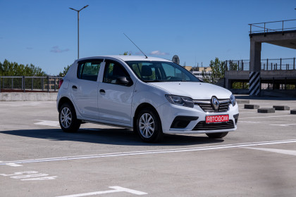 Продажа Renault Sandero II Рестайлинг 1.6 MT (82 л.с.) 2018 Белый в Автодом