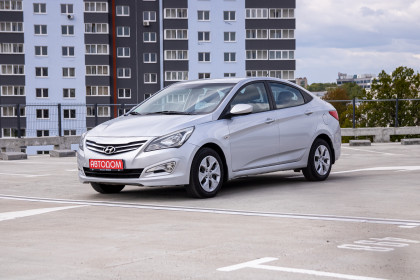Продажа Hyundai Solaris I Рестайлинг 1.4 MT (107 л.с.) 2014 Серебристый в Автодом