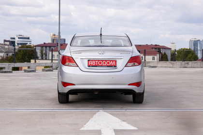 Продажа Hyundai Solaris I Рестайлинг 1.4 MT (107 л.с.) 2014 Серебристый в Автодом