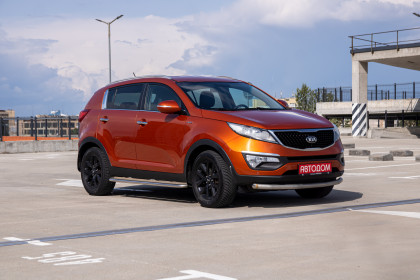 Продажа Kia Sportage III Рестайлинг 2.0 AT (150 л.с.) 2014 Оранжевый в Автодом