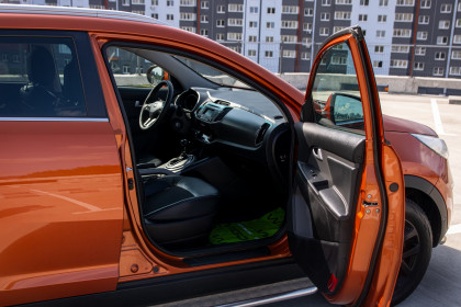 Продажа Kia Sportage III Рестайлинг 2.0 AT (150 л.с.) 2014 Оранжевый в Автодом