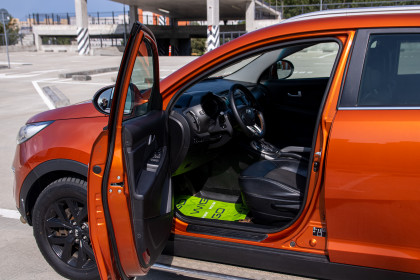 Продажа Kia Sportage III Рестайлинг 2.0 AT (150 л.с.) 2014 Оранжевый в Автодом