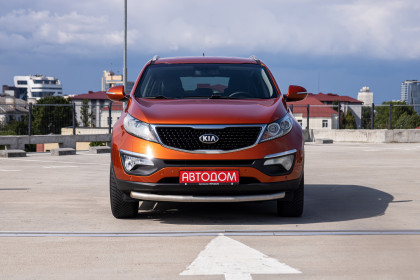 Продажа Kia Sportage III Рестайлинг 2.0 AT (150 л.с.) 2014 Оранжевый в Автодом