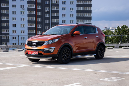 Продажа Kia Sportage III Рестайлинг 2.0 AT (150 л.с.) 2014 Оранжевый в Автодом