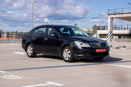 Продажа Skoda Octavia II (A5) Рестайлинг 1.6 MT (102 л.с.) 2012 Черный в Автодом