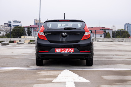 Продажа Hyundai Solaris I Рестайлинг 1.4 AT (107 л.с.) 2015 Черный в Автодом