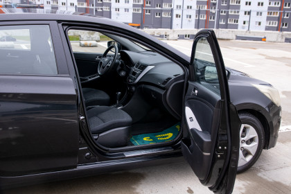 Продажа Hyundai Solaris I Рестайлинг 1.4 AT (107 л.с.) 2015 Черный в Автодом