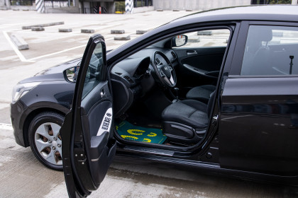 Продажа Hyundai Solaris I Рестайлинг 1.4 AT (107 л.с.) 2015 Черный в Автодом