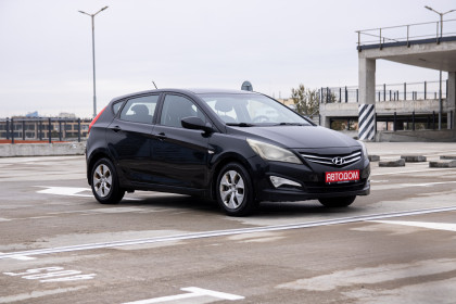 Продажа Hyundai Solaris I Рестайлинг 1.4 AT (107 л.с.) 2015 Черный в Автодом