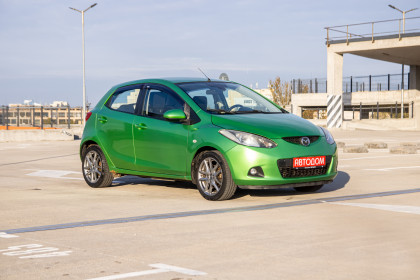 Купить Mazda 2 II (DE) 1.3 MT (86 л.с.) 2008 Зеленый в Автодом Продажа Mazda 2 II (DE) 1.3 MT (86 л.с.) 2008 Зеленый в Автодом