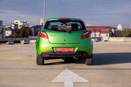 Купить Mazda 2 II (DE) 1.3 MT (86 л.с.) 2008 Зеленый в Автодом Продажа Mazda 2 II (DE) 1.3 MT (86 л.с.) 2008 Зеленый в Автодом