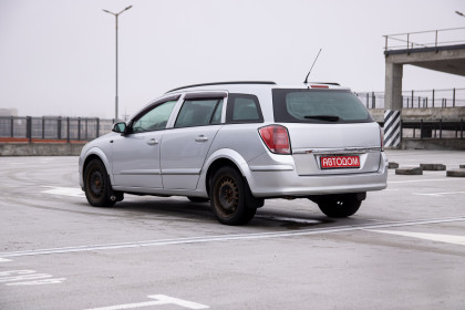 Продажа Opel Astra H 1.6 MT (105 л.с.) 2005 Серебристый в Автодом