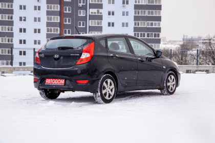 Продажа Hyundai Solaris I 1.4 MT (107 л.с.) 2011 Черный в Автодом