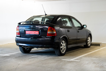 Продажа Opel Astra G 2.0 MT (101 л.с.) 2002 Черный в Автодом