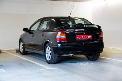 Продажа Opel Astra G 2.0 MT (101 л.с.) 2002 Черный в Автодом