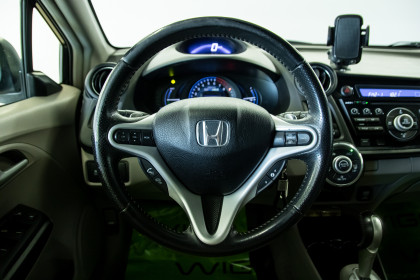 Продажа Honda Insight II Рестайлинг 1.3 CVT (98 л.с.) 2013 Черный в Автодом