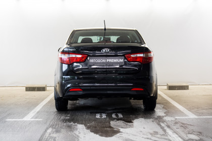 Продажа Kia Rio III 5-speed 1.6 MT (123 л.с.) 2013 Черный в Автодом