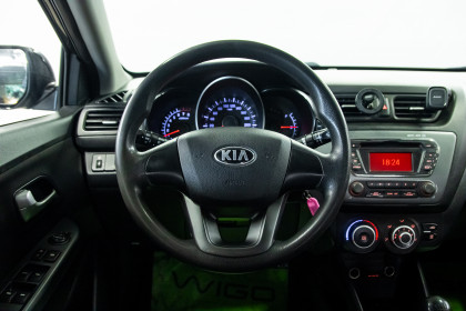 Продажа Kia Rio III 5-speed 1.6 MT (123 л.с.) 2013 Черный в Автодом