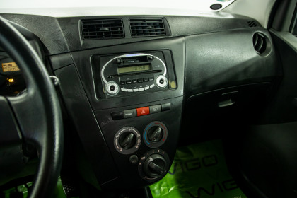Продажа Daihatsu Cuore VII (L276) 1.0 MT (69 л.с.) 2008 Синий в Автодом