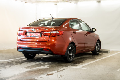 Продажа Kia Rio III 5-speed 1.6 MT (123 л.с.) 2013 Красный в Автодом