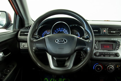 Продажа Kia Rio III 5-speed 1.6 MT (123 л.с.) 2013 Красный в Автодом
