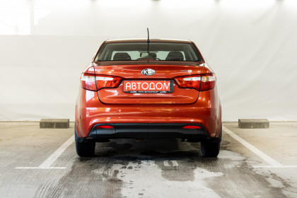 Продажа Kia Rio III 5-speed 1.6 MT (123 л.с.) 2013 Красный в Автодом